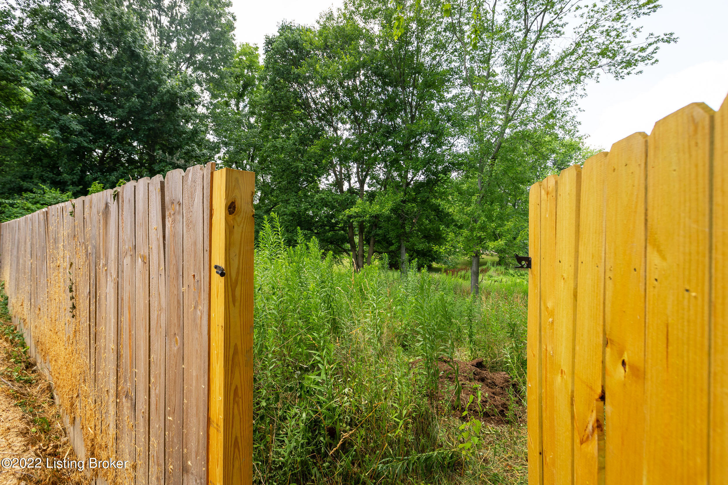 4204 Dover Road Louisville, KY 40216 - Photo 58 of 59 property extends beyond the rear property fence, so nearly the tree line