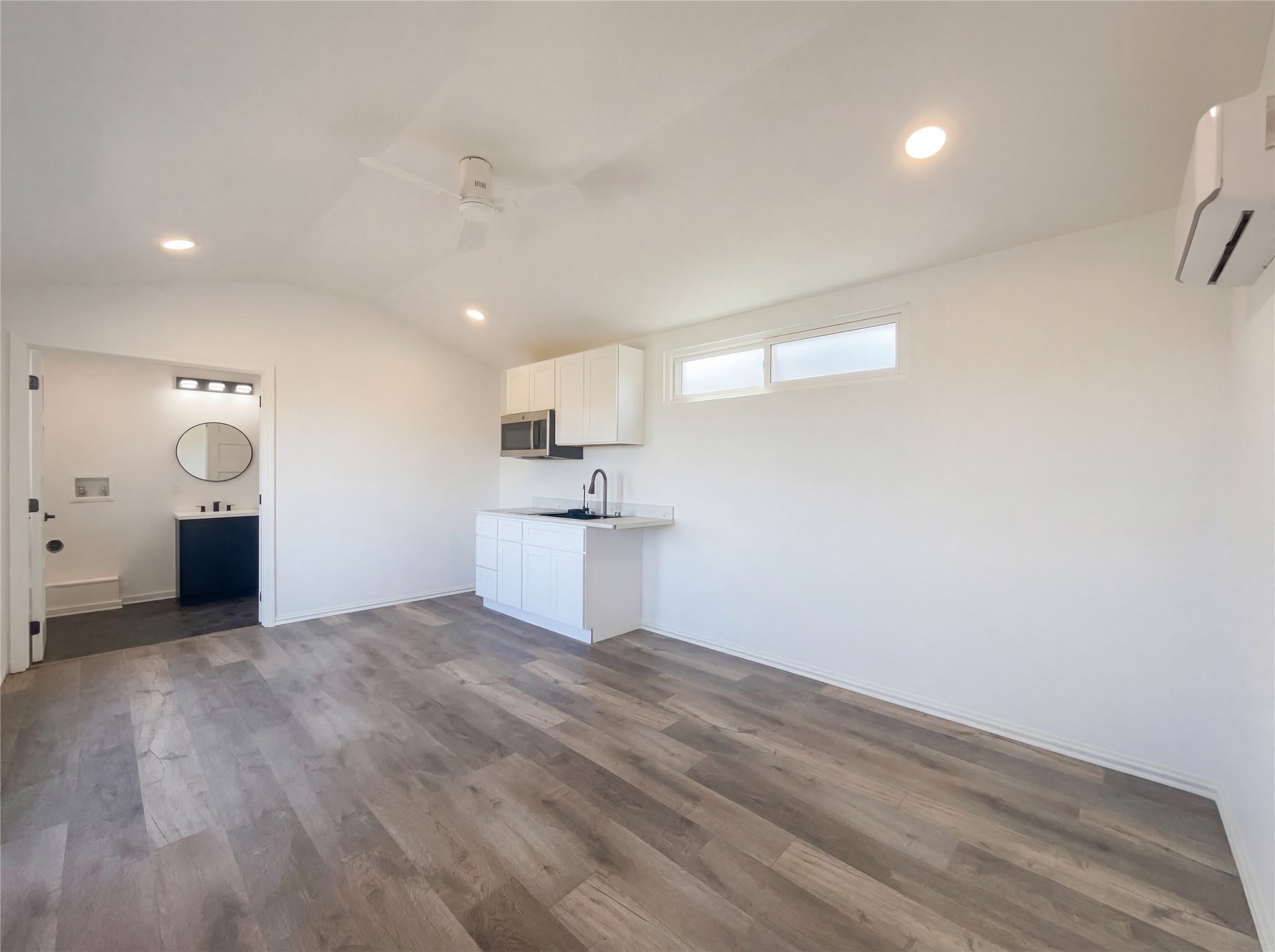 15305 Lucian Street Austin, TX 78725 - Photo 23 of 25 a view of a kitchen with a sink and cabinets