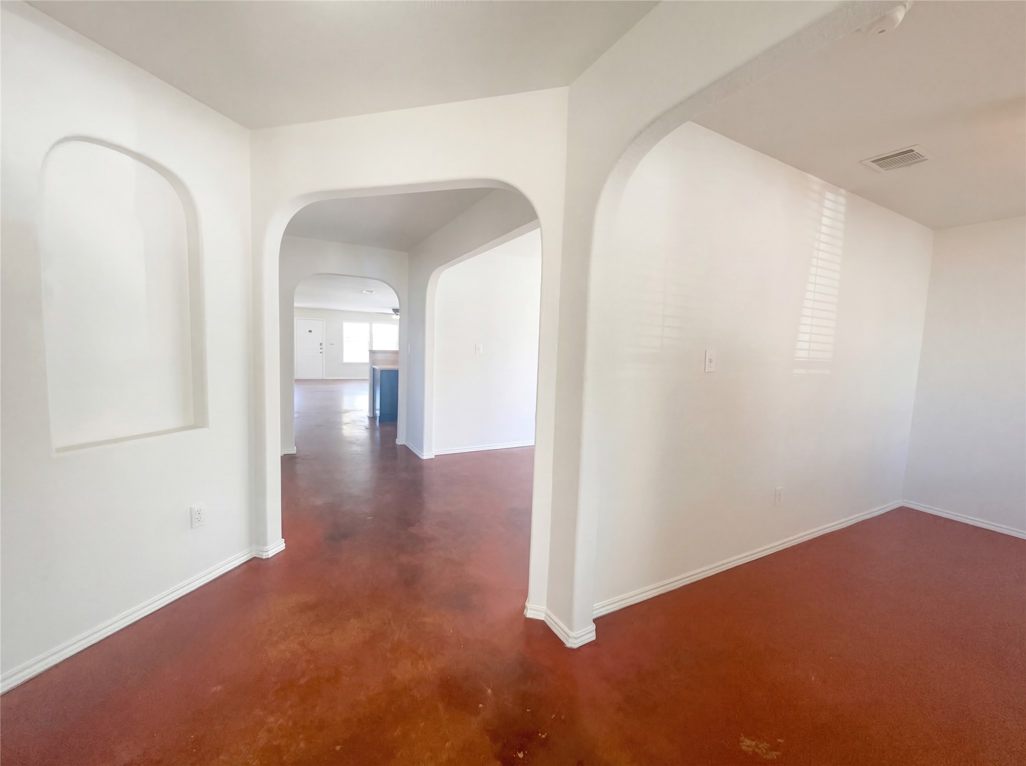15305 Lucian Street Austin, TX 78725 - Photo 7 of 25 a view of a room with wooden floor