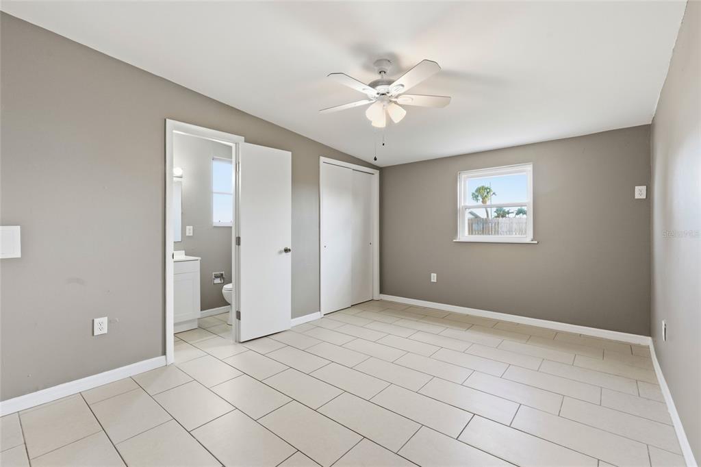 363 Glen Oak Road Venice, FL 34293 - Photo 30 of 53 a view of an empty room with chandelier fan