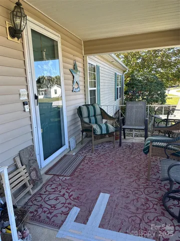 a sign board on the side of a street