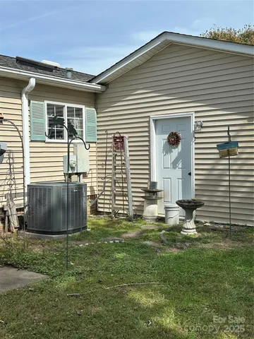 a front view of a house with outdoor seating
