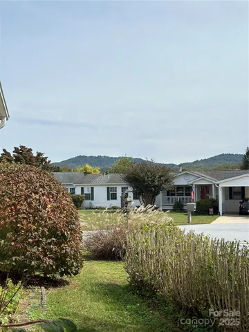 a view of a large body of water with a building in the background