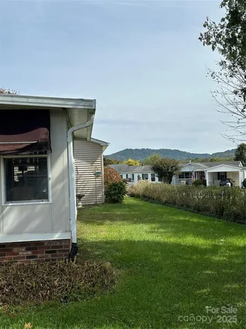 a view of a porch in front of house