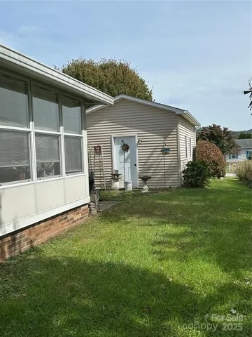 a house view with a garden space