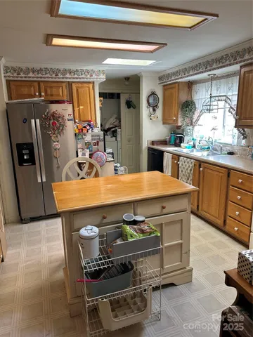 a outdoor dining space with furniture and window