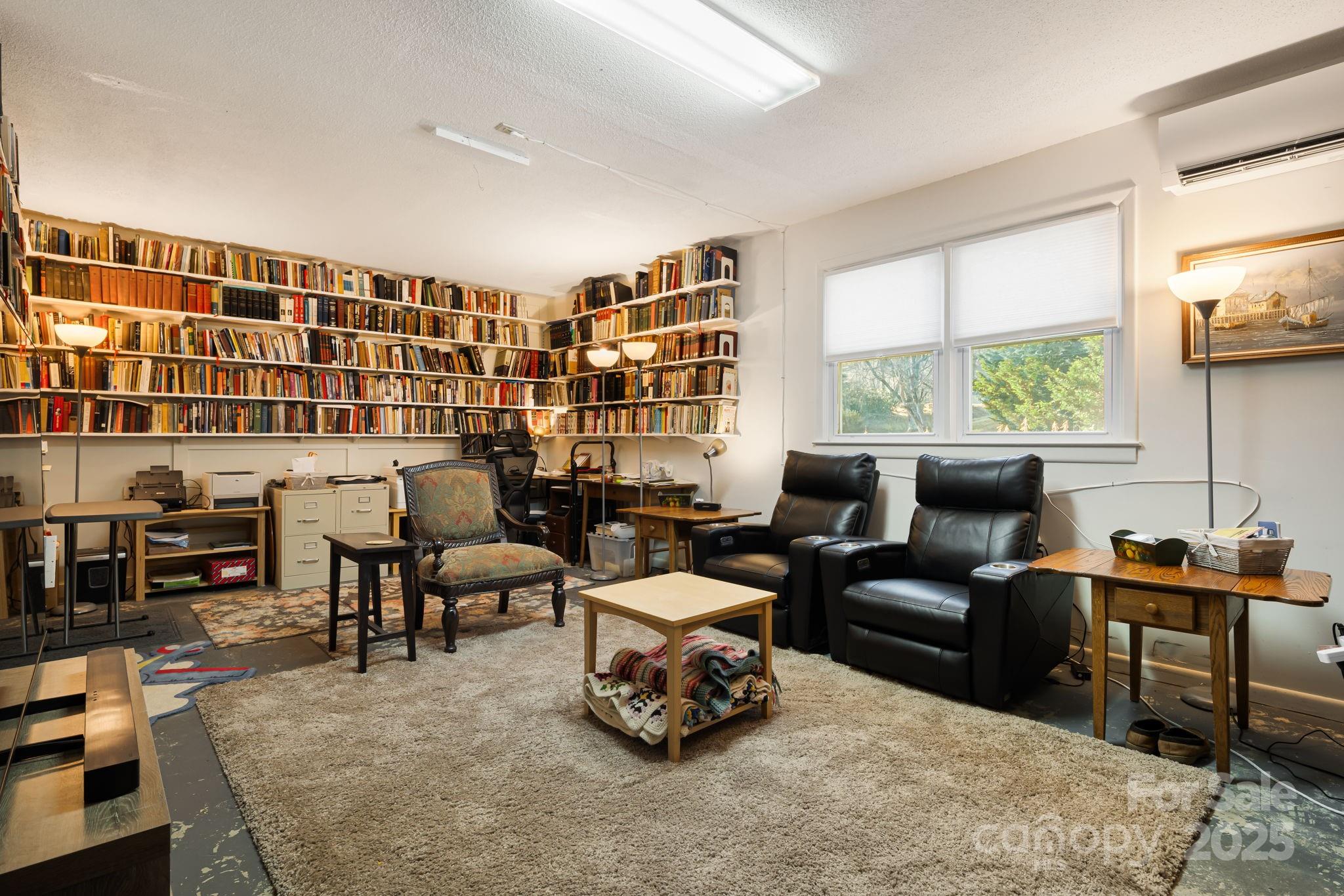 154 Harris Street Spruce Pine, NC 28777 - Photo 23 of 37 a living room with furniture and a large window
