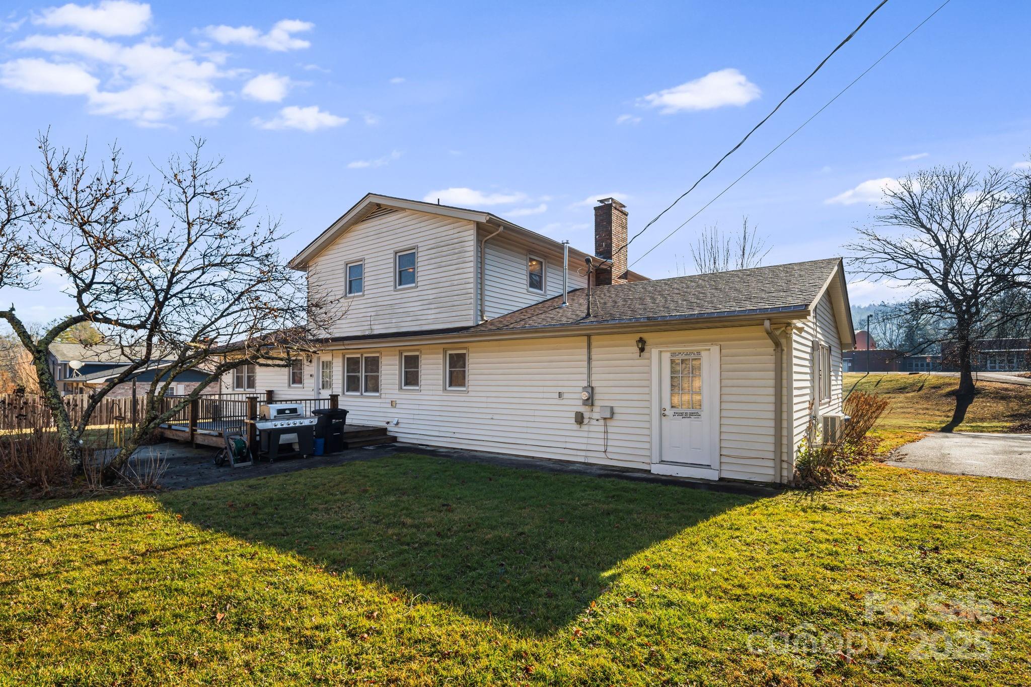 154 Harris Street Spruce Pine, NC 28777 - Photo 35 of 37 a front view of a house with a yard