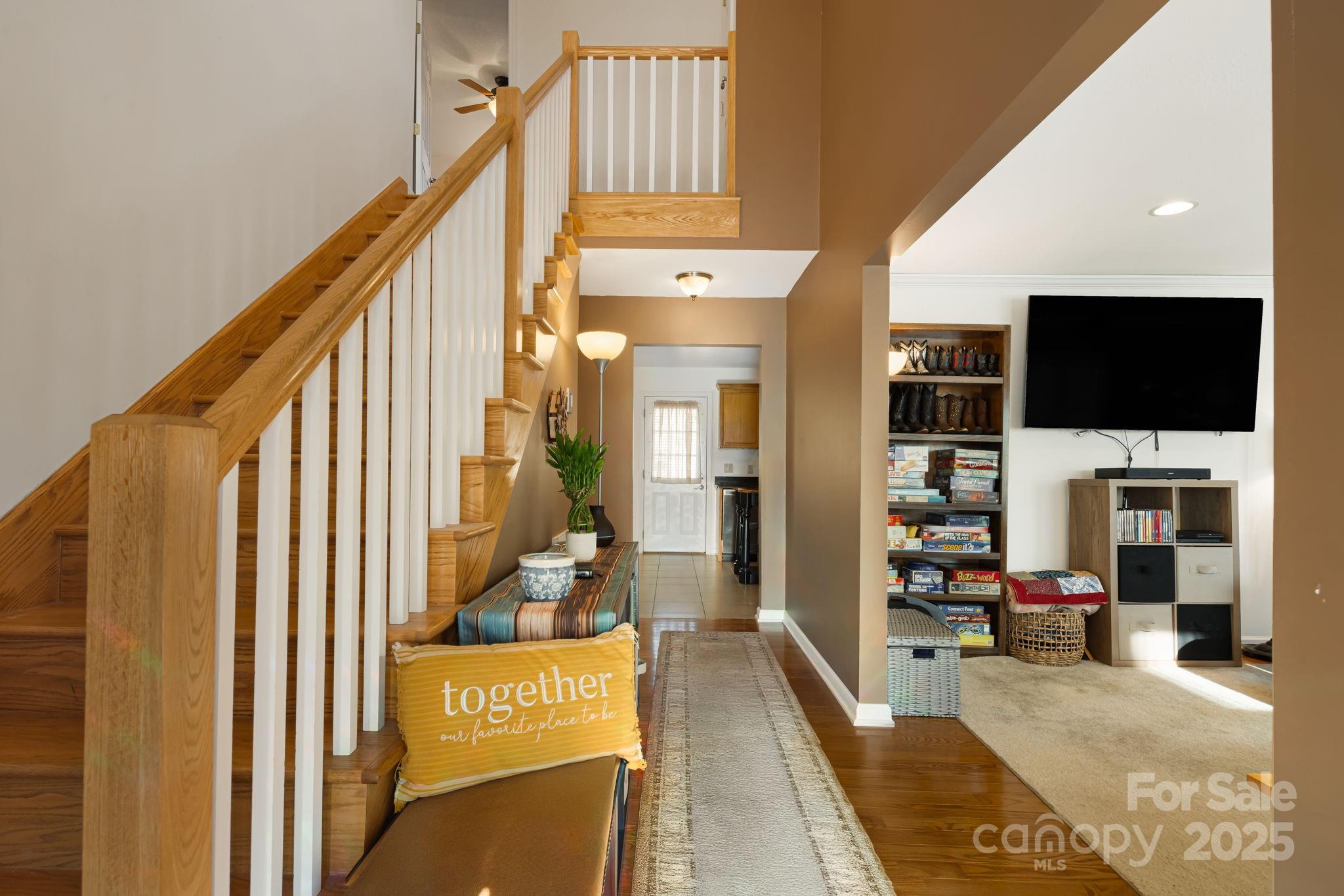 154 Harris Street Spruce Pine, NC 28777 - Photo 6 of 37 a view of a living room with furniture and a flat screen tv