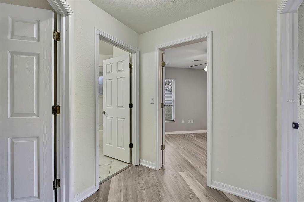 12052 Jade Avenue Spring Hill, FL 34609 - Photo 15 of 45 a view of a bathroom from the hallway