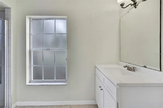 a bathroom with a bathtub and toilet