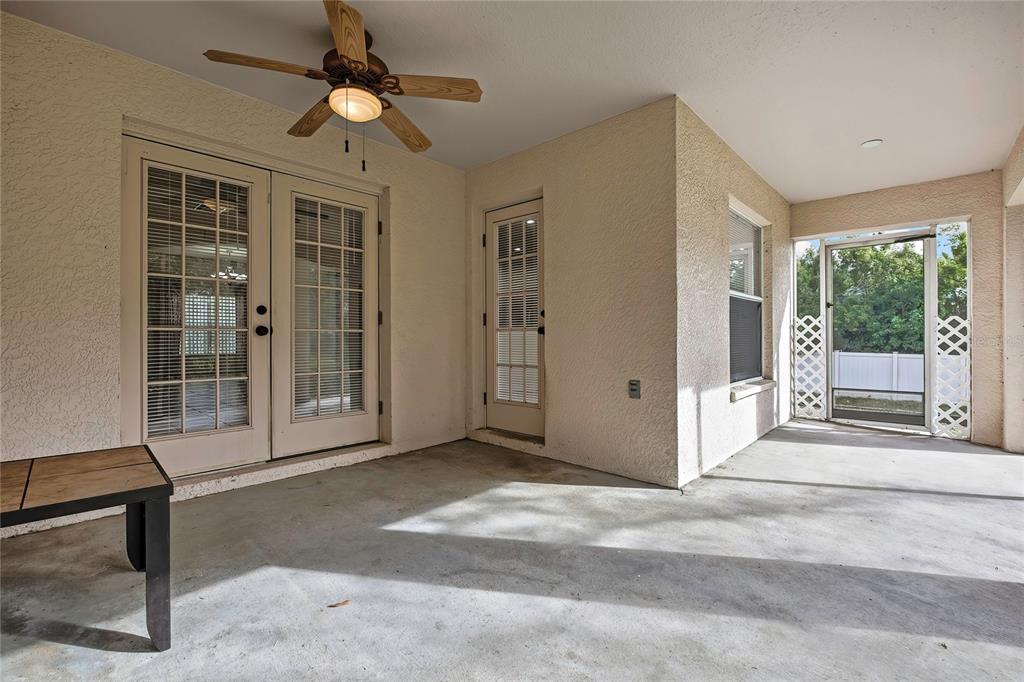 12052 Jade Avenue Spring Hill, FL 34609 - Photo 37 of 45 a view of a livingroom with a ceiling fan and window
