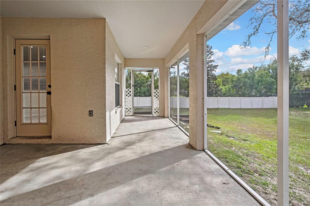 12052 Jade Avenue Spring Hill, FL 34609 - Photo 38 of 45 a view of an outdoor space and balcony