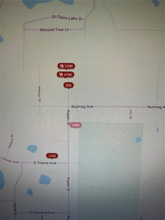 Aspen Street Eustis, FL 32736 - Photo 3 of 19 a bathroom with a shower and cabinets