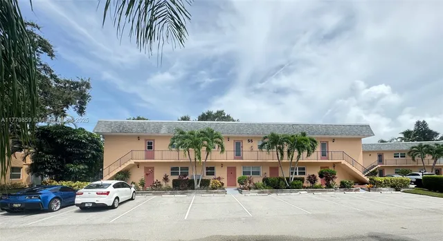 a view of multiple houses with a street