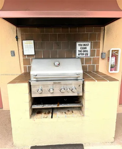 a view of kitchen island with stove