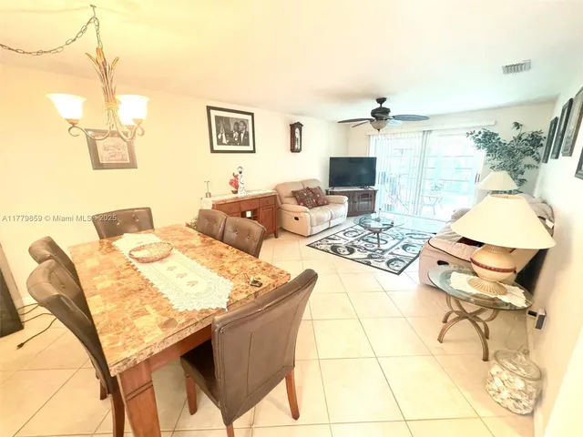 a living room with a couch and a table