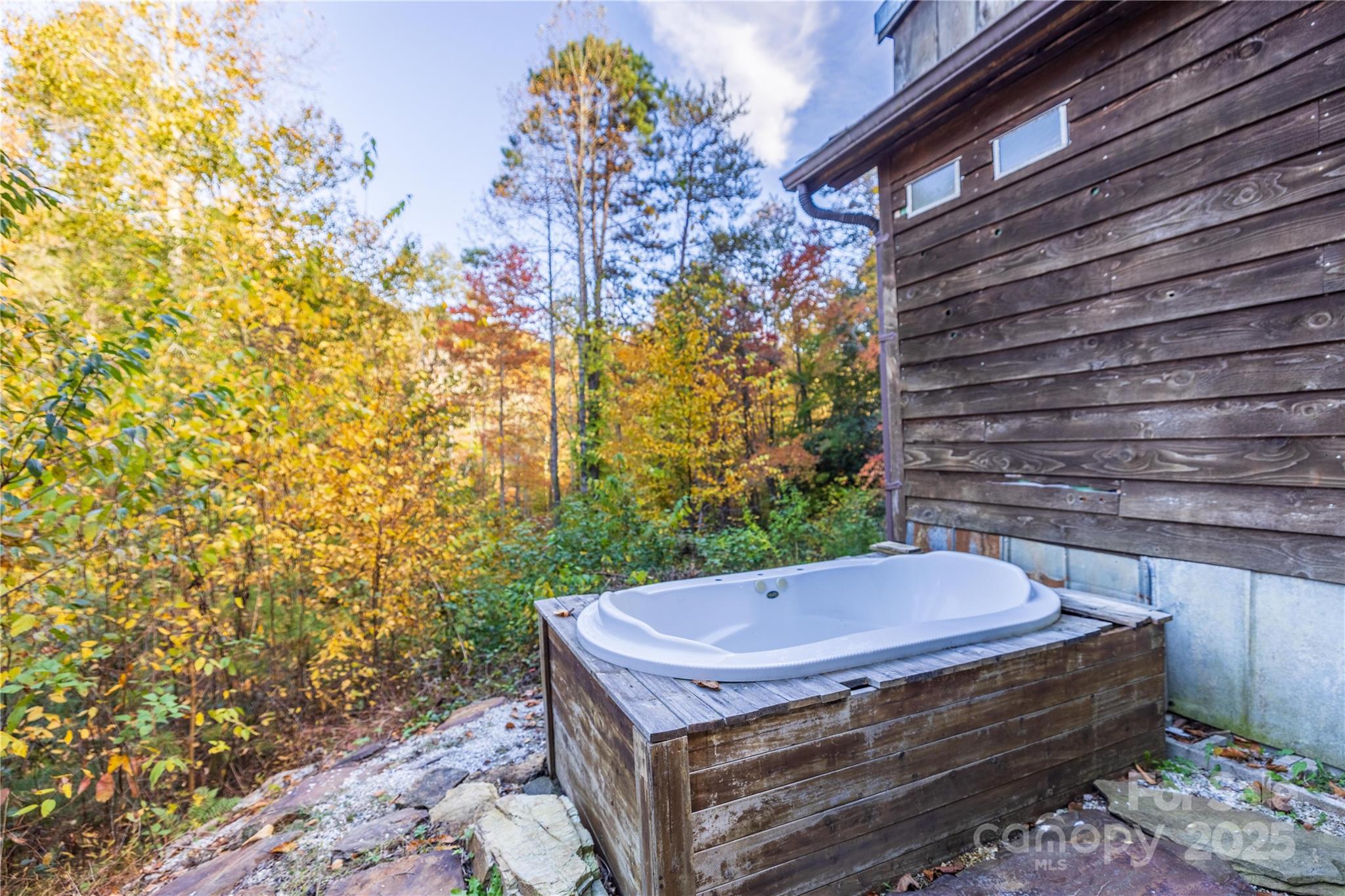 3929 Parker Padgett Road Old Fort, NC 28762 - Photo 13 of 23 a view of a backyard with chairs