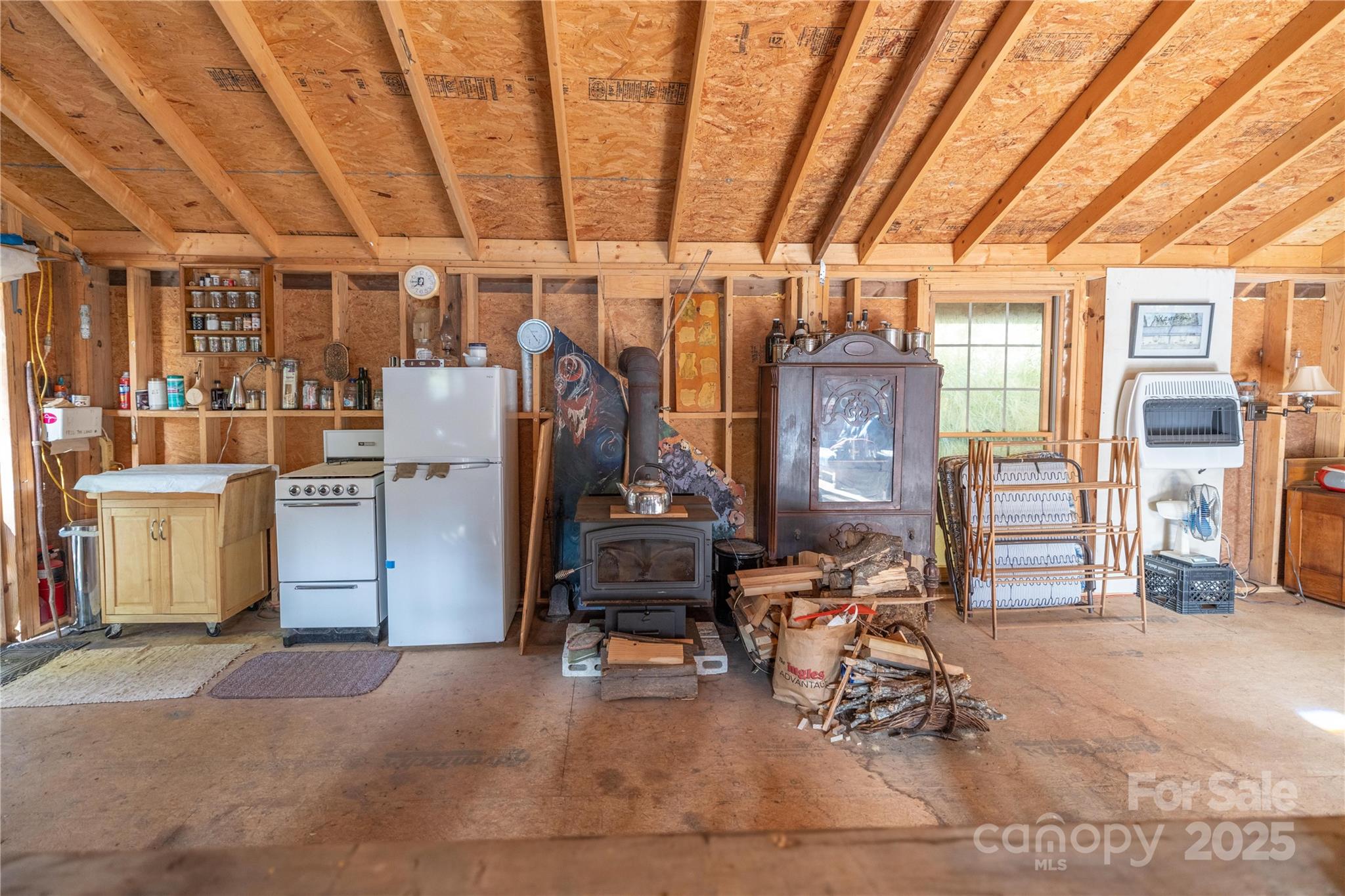 3929 Parker Padgett Road Old Fort, NC 28762 - Photo 18 of 23 a view of a room with gym equipment