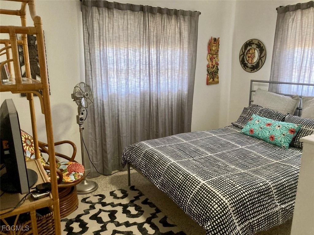 4360 Deleon Street Fort Myers, FL 33901 - Photo 11 of 23 a bedroom with a bed and a window