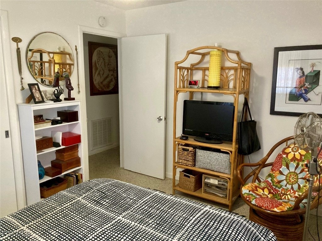 4360 Deleon Street Fort Myers, FL 33901 - Photo 12 of 23 a living room with furniture and a flat screen tv