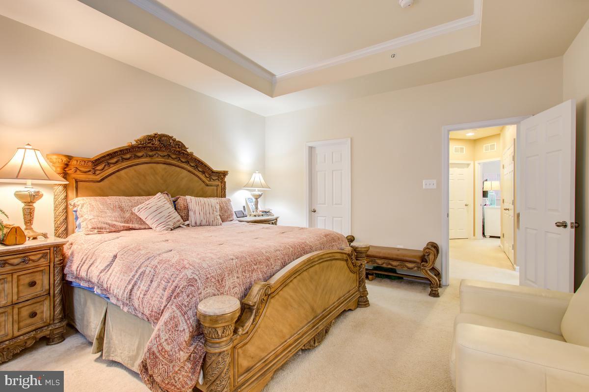 12601 Rustic Rock Lane Beltsville, MD 20705 - Photo 19 of 33 a bedroom with a bed and a couch