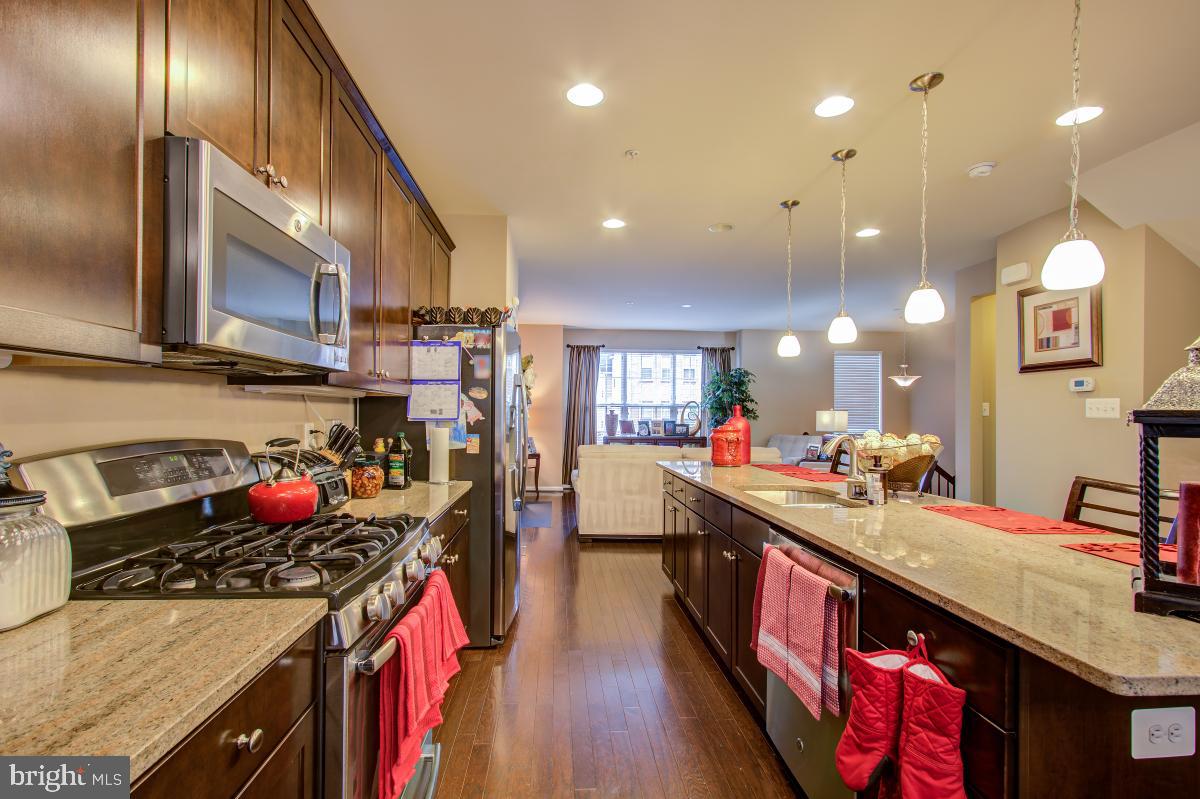 12601 Rustic Rock Lane Beltsville, MD 20705 - Photo 10 of 33 a kitchen with lots of counter top space