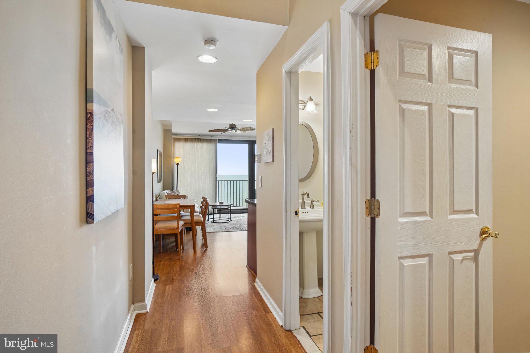 902 Chesapeake House Road, Unit 902N Bethany Beach, DE 19930 - Photo 7 of 37 Inviting hallway with coastal views.