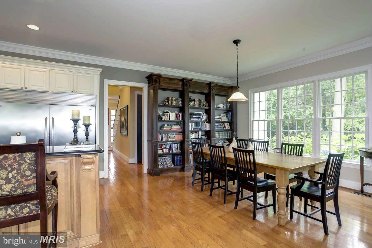 733 Whitehall Plains Road Annapolis, MD 21409 - Photo 3 of 18 a view of a dining room with furniture window and outside view