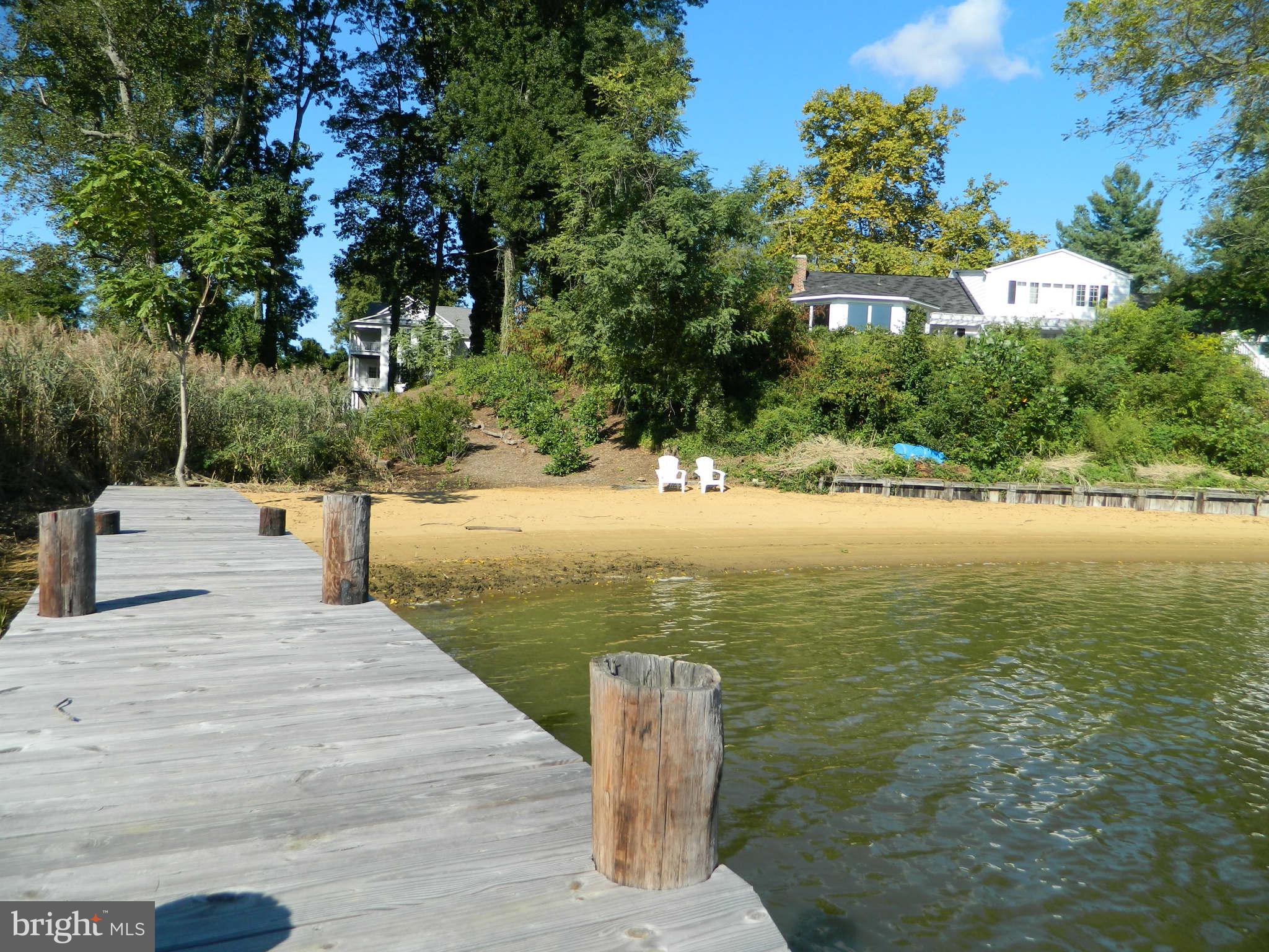 733 Whitehall Plains Road Annapolis, MD 21409 - Photo 5 of 18 a view of a lake with outdoor space