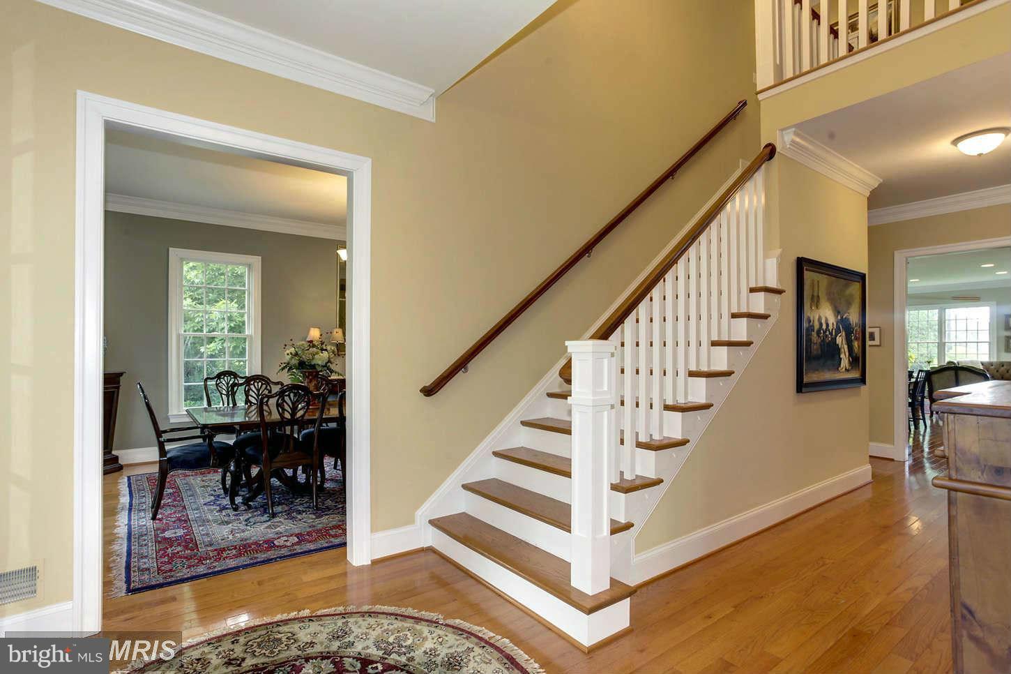 733 Whitehall Plains Road Annapolis, MD 21409 - Photo 8 of 18 a view of entryway and hall with dining room