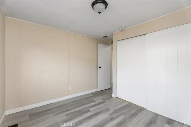 a bathroom with a shower sink vanity mirror and toilet