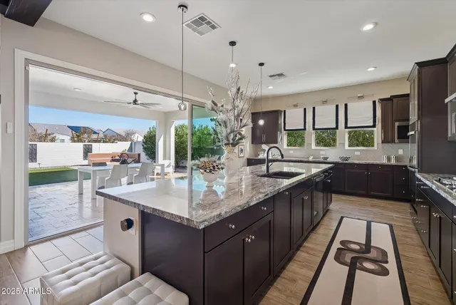 a bedroom with a bed and a potted plant