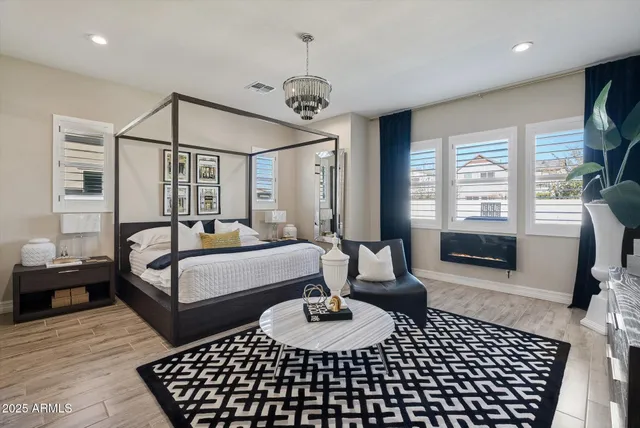 a bathroom with a shower and a glass door