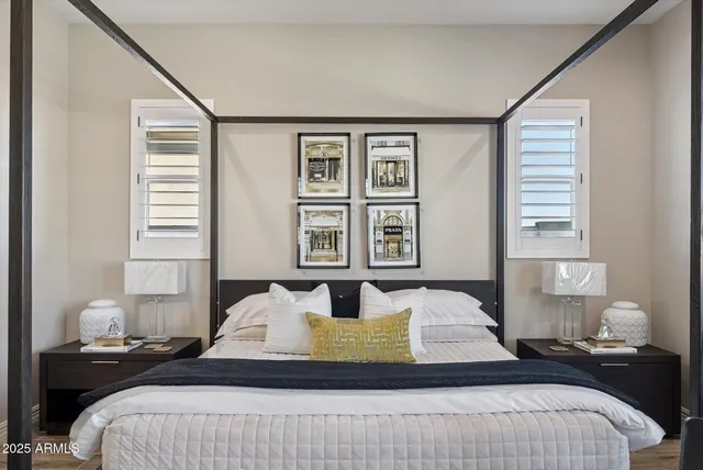 a en suite bathroom with a toilet sink and mirror