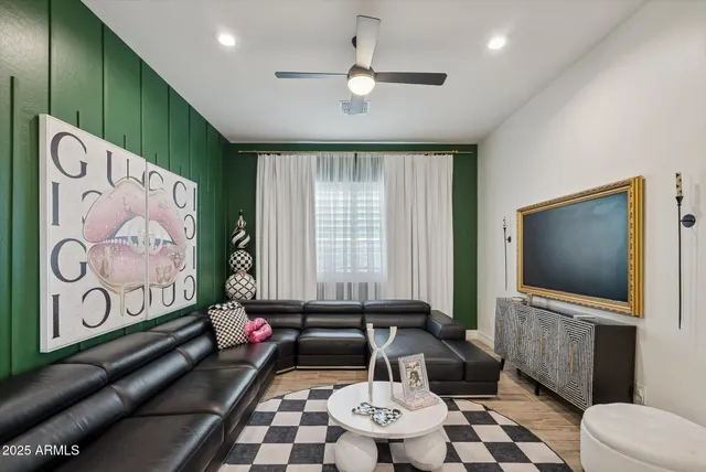 a bathroom with a sink a toilet a tub and shower