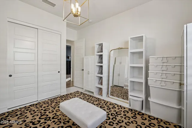 a view of a house with a backyard porch and sitting area