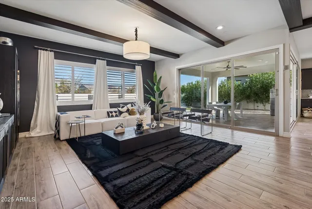 a kitchen with stainless steel appliances granite countertop a sink and cabinets