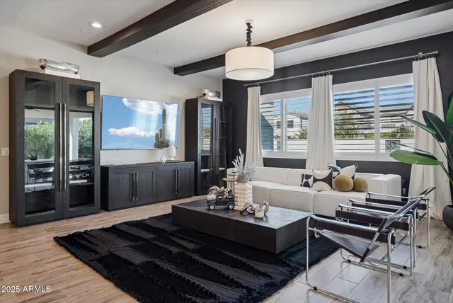 a kitchen with stainless steel appliances granite countertop a sink refrigerator and cabinets