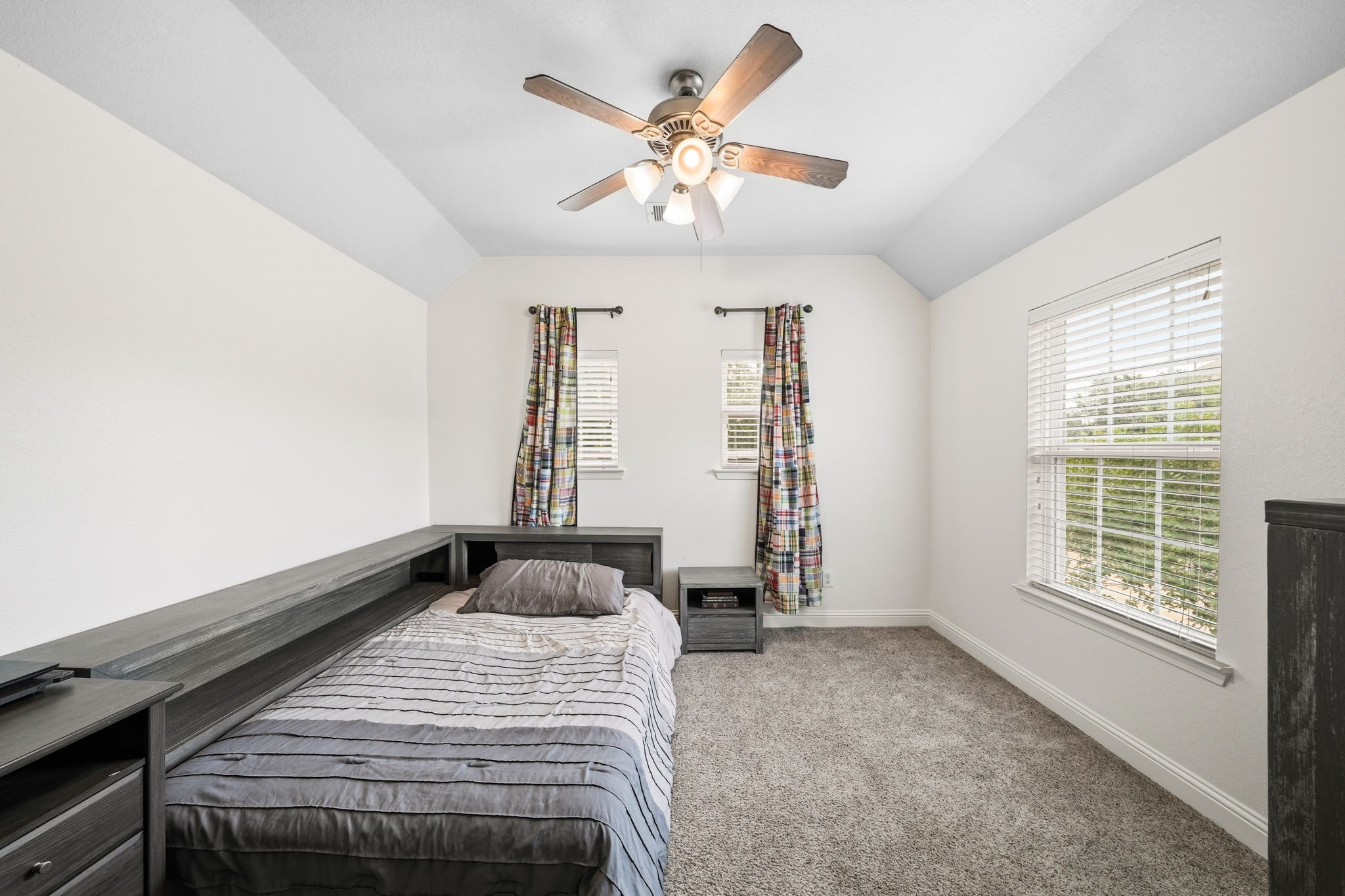 17610 Strackfield Lane Tomball, TX 77377 - Photo 43 of 50 Warm, comfortable, and beautifully appointed, the fifth bedroom features plush carpet and an elegant tray ceiling, making it ideal for family or guests.