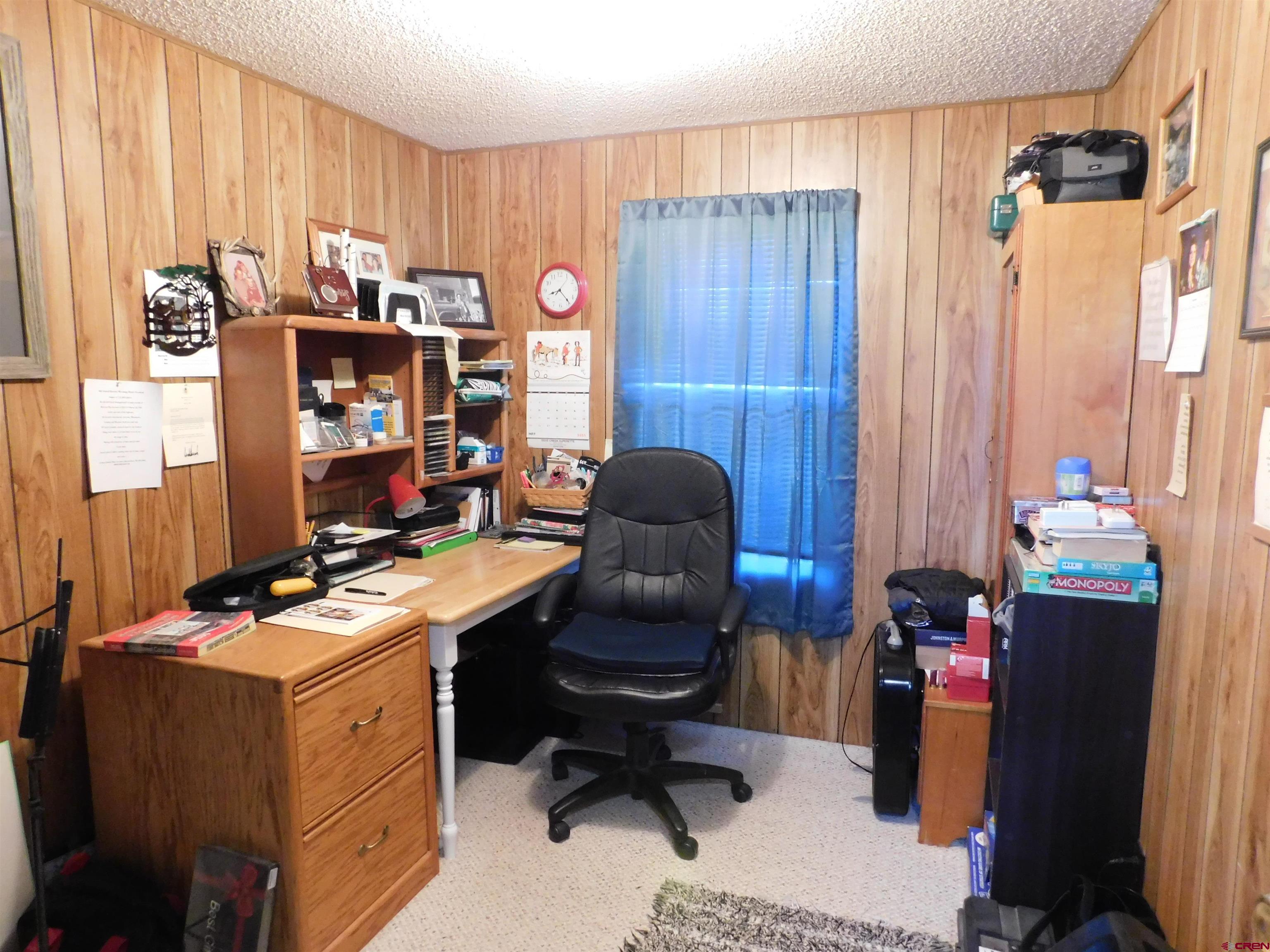 23300 Rd X Lewis, CO 81327 - Photo 15 of 44 a work place with furniture and a window