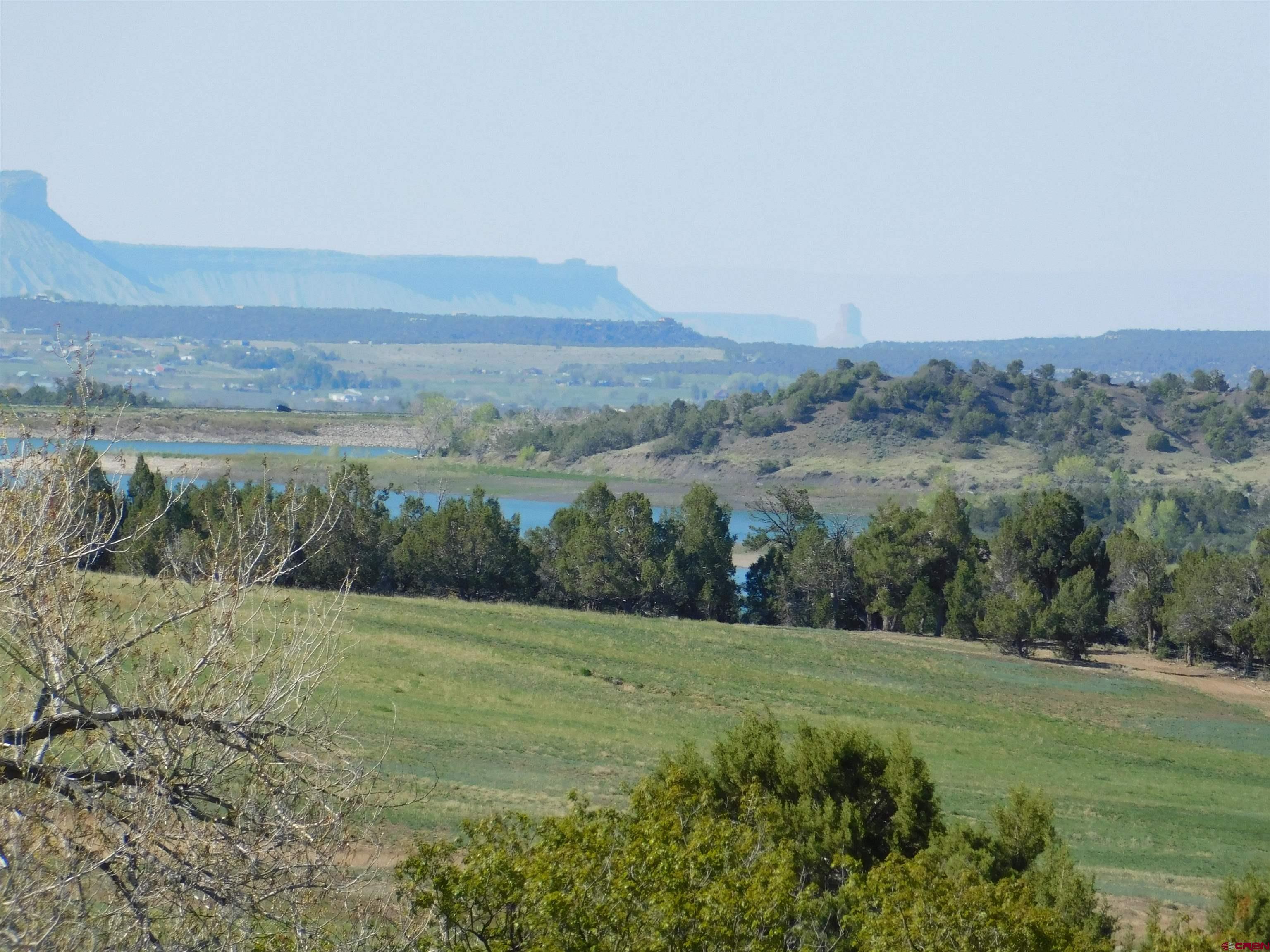 23300 Rd X Lewis, CO 81327 - Photo 20 of 44 a view of a field with an ocean