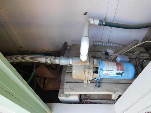 a view of a backyard of the house