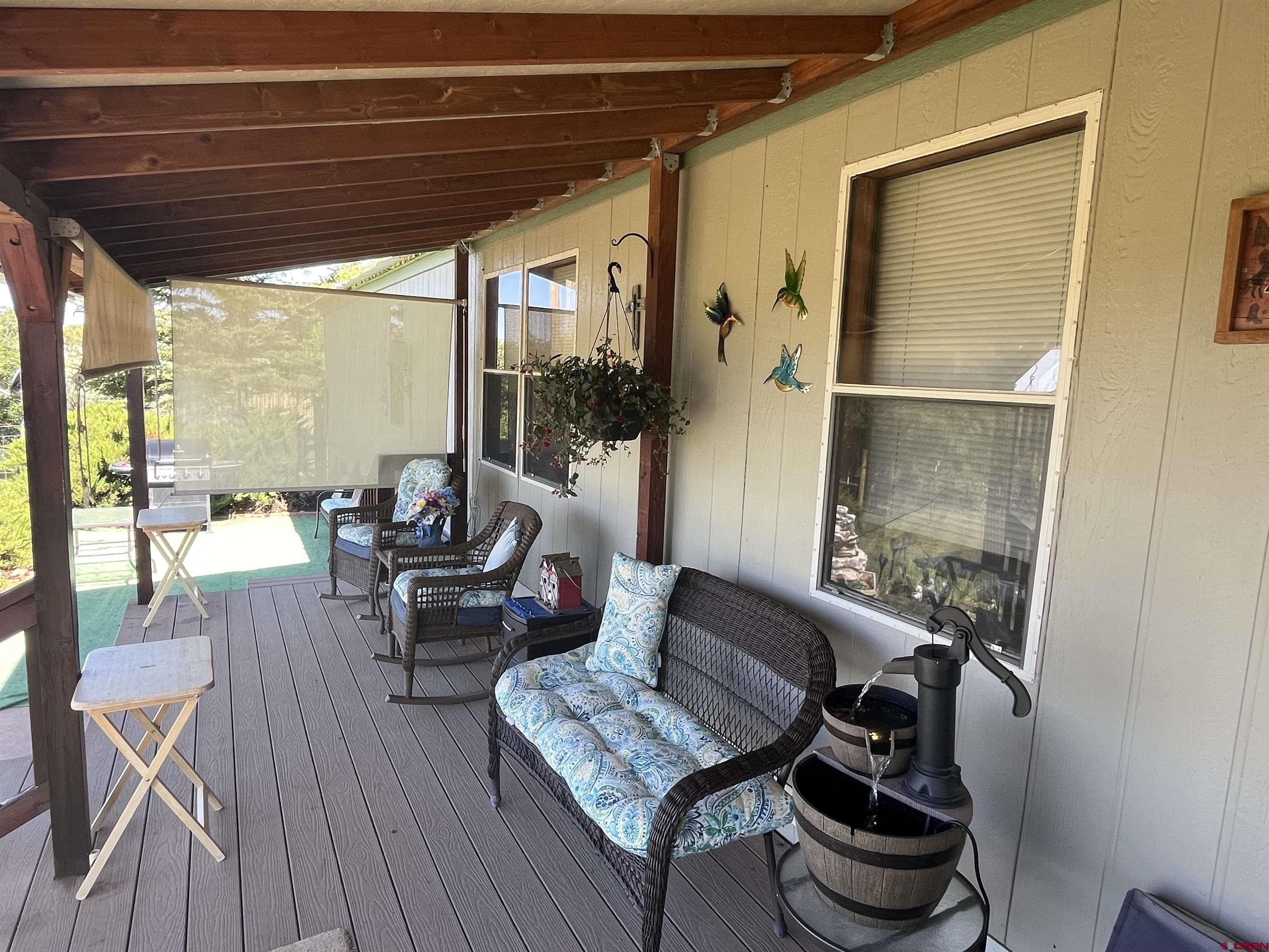 23300 Rd X Lewis, CO 81327 - Photo 34 of 44 a living room with furniture and a window
