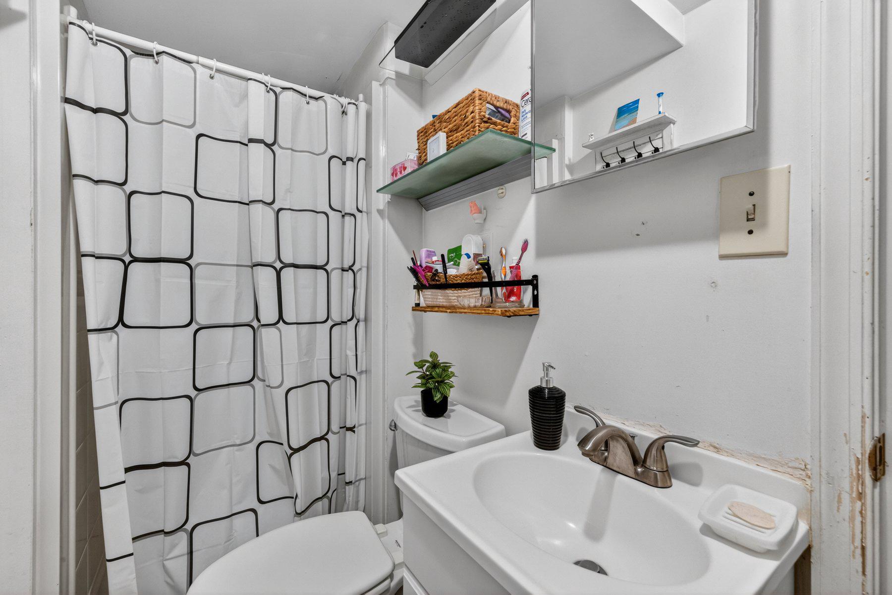 2311 Coleridge Drive Silver Spring, MD 20910 - Photo 36 of 47 Charming full bathroom with modern accents.