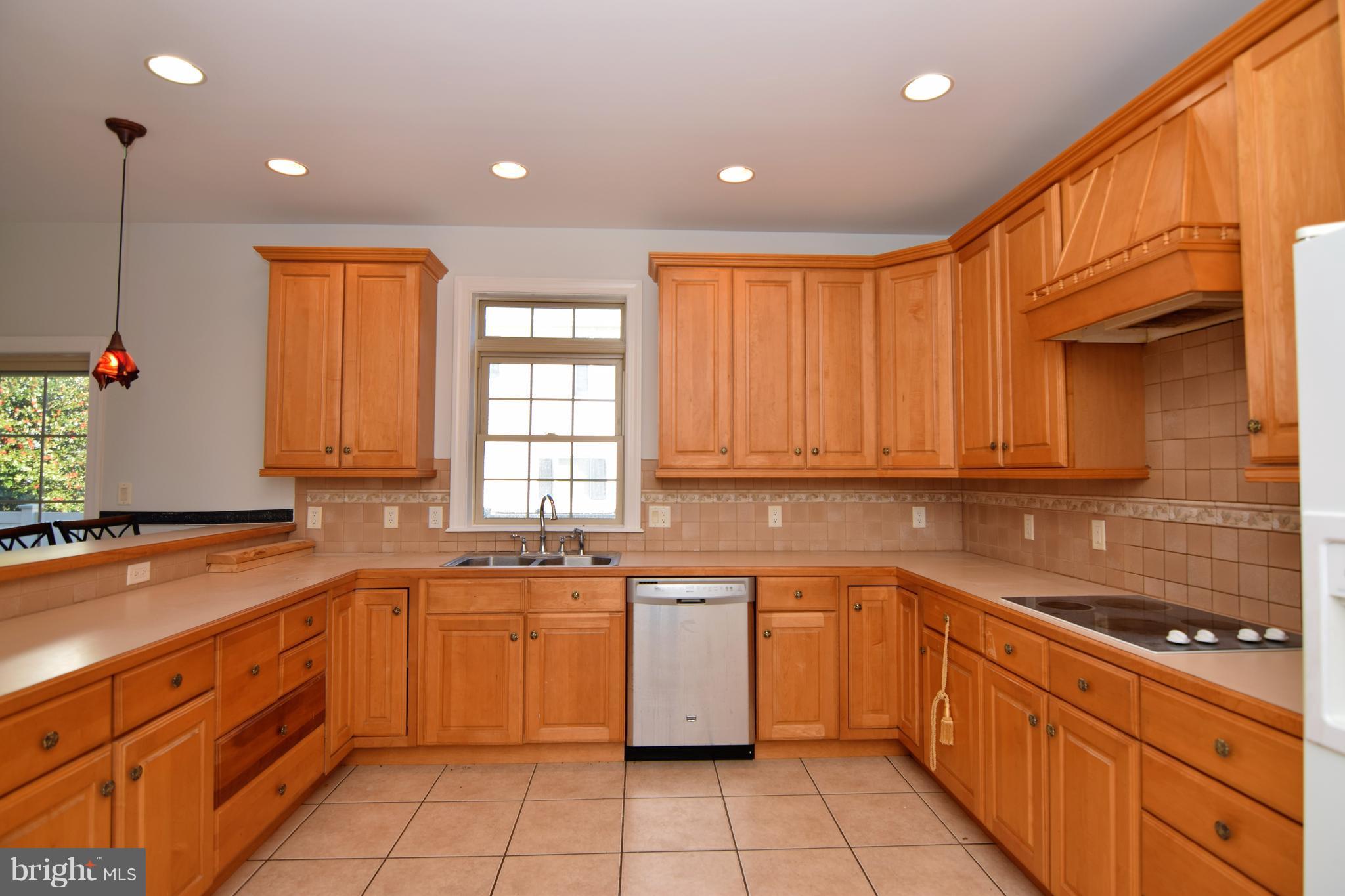 714 South Surf Road Ocean City, MD 21842 - Photo 14 of 38 Open Kitchen with tons of cabinet space!