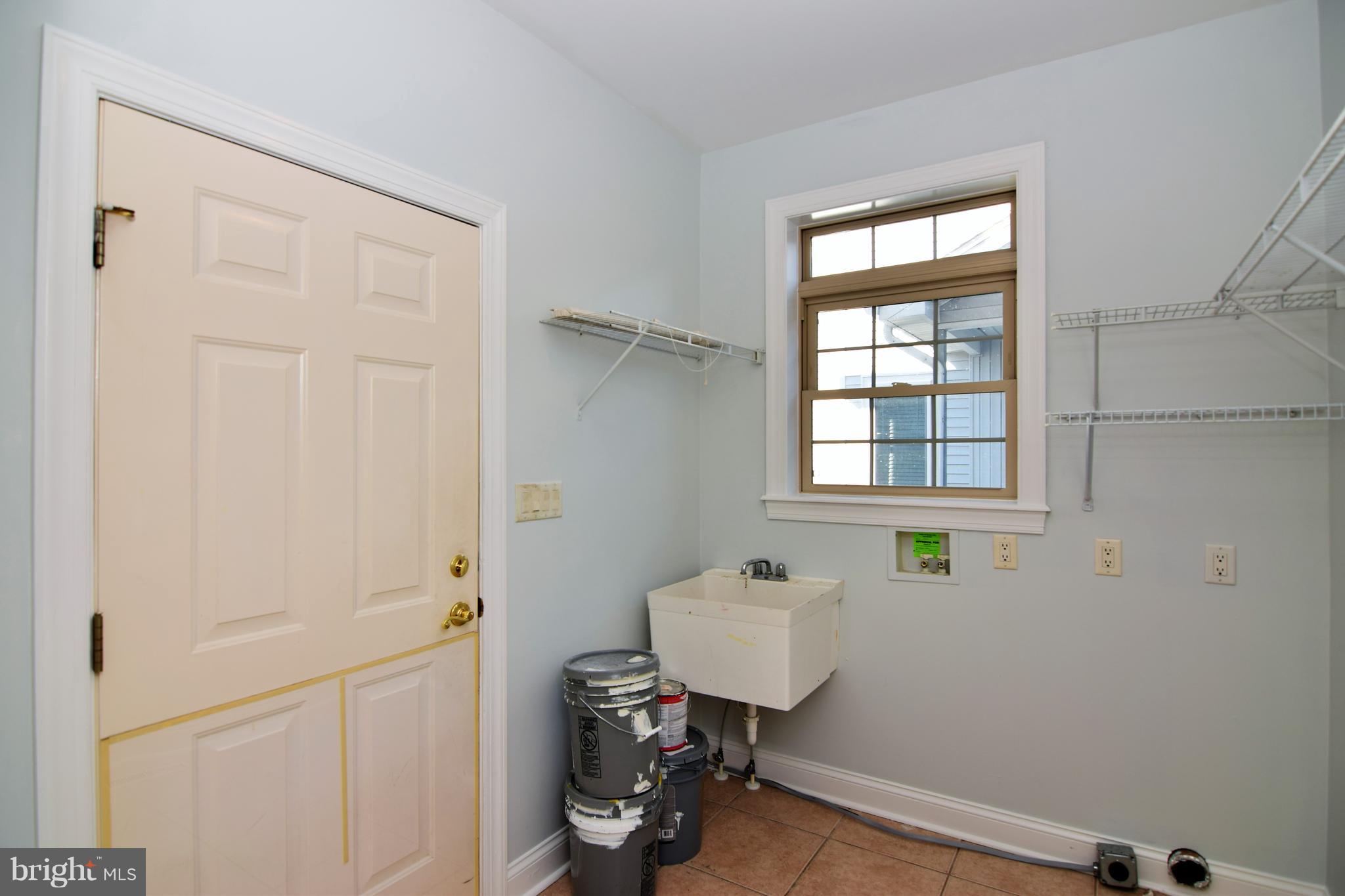 714 South Surf Road Ocean City, MD 21842 - Photo 18 of 38 Laundry / Mudroom and door to garage!