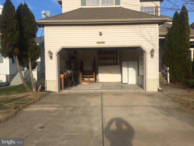 714 South Surf Road Ocean City, MD 21842 - Photo 5 of 38 Spacious 2 car garage for all your toys!!