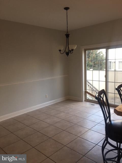 714 South Surf Road Ocean City, MD 21842 - Photo 10 of 38 Open dining off kitchen!