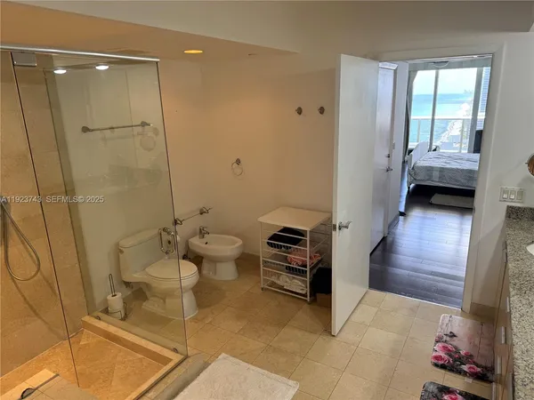a bathroom with a sink and toilet